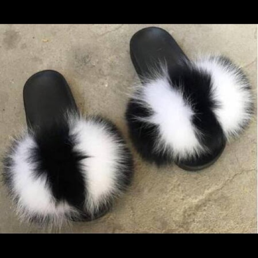 Black and white faux fur slides